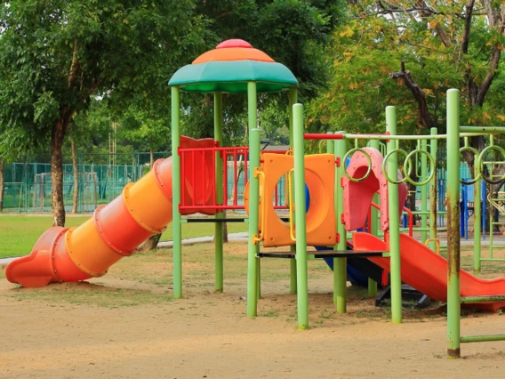 Ourdoor play area, orange and green structure